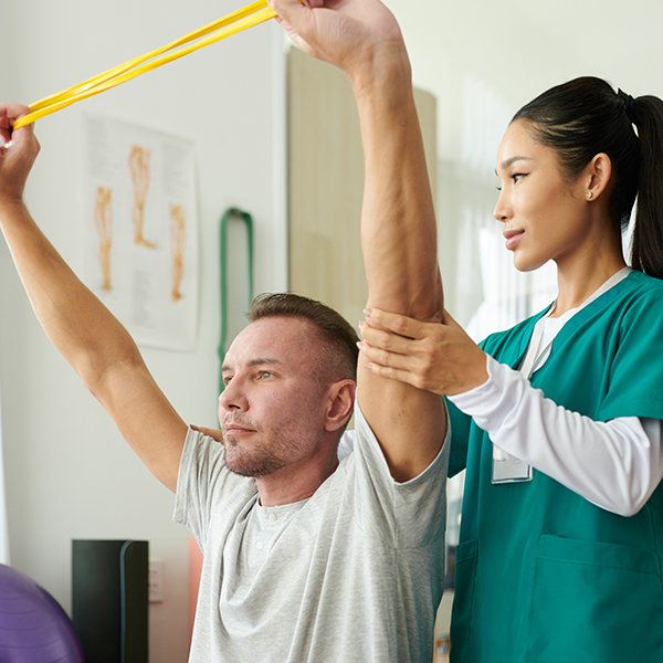 physical-therapy-office-mep-design-capco2 physical therapist and client